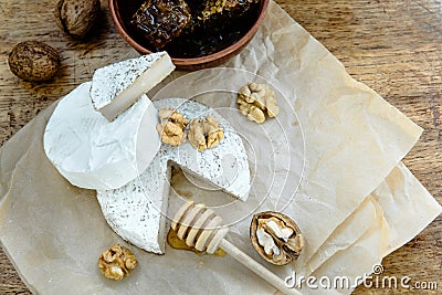 Variety of farm dairy appetizers cheese with walnuts Stock Photo