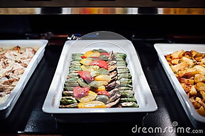 Variety of grilled vegetables served on a special occasion celebration buffet dinner.Vegan side dish.Mediterranean ketogenic diet. Stock Photo