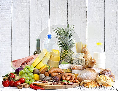 Variety of grocery products fruits vegetables meat cheese Stock Photo