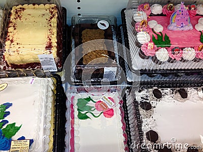 Variety of grocery store cakes Editorial Stock Photo