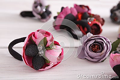 Variety of hair rubbers decorated with flowers Stock Photo