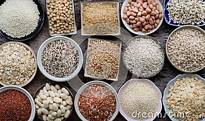Variety kind of dry organic cereal and grain seeds in wooden bowl Stock Photo