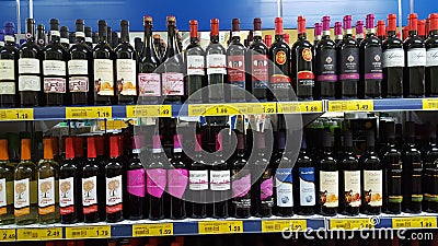 Variety of liquors in an Italian supermarket Editorial Stock Photo