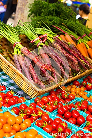 Tomatoes and carrots farmers market Stock Photo