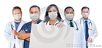 Variety of Medical Healthcare Workers Wearing Medical Face Masks Holding Blank Sign Amidst the Coronavirus Pandemic Stock Photo