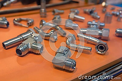 Variety of metal fittings for water on the counter Stock Photo