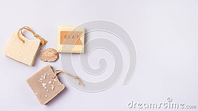 Variety of Natural Soaps on Blue Background Handmade Organic Soaps Vertical Banner Copy Space Stock Photo