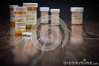 Variety of Non-Proprietary Prescription Medicine Bottles and Pills Stock Photo