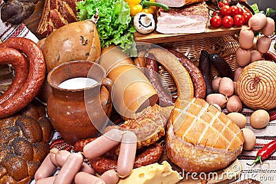 Variety of sausage products, cheese, eggs and vegetables. Stock Photo