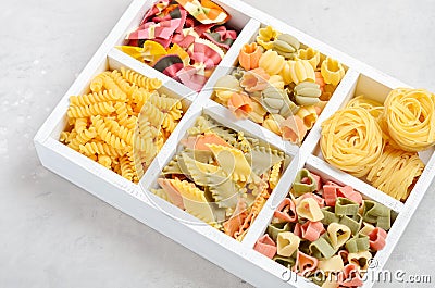 Variety of types and shapes of raw Italian pasta. Stock Photo