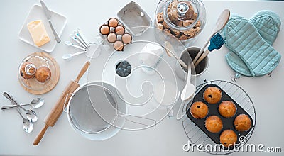 Various baking products on kitchen counter from above. Baking utensils on a kitchen table. Still life of food and Stock Photo