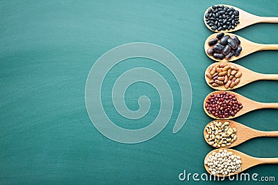 Various beans on green chalkboard Stock Photo