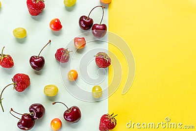 Various berries isolated on colorful background, top view. Berry border frame. Flat lay.fresh berries pattern.Summer Stock Photo