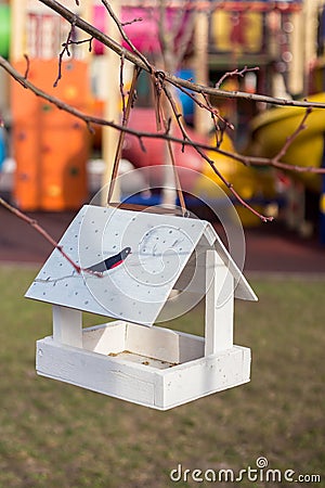 Various bird feeders on the territory of the Lyceum in Kiev in Troyeshchina. Creativity of children Stock Photo