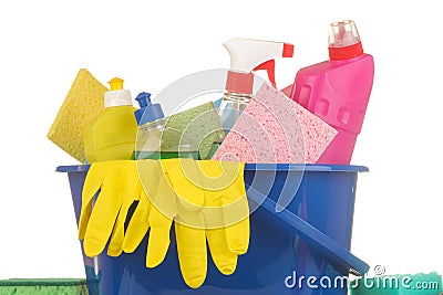 Various bottles with cleaning products and detergents in a blue bucket on a white isolated background Stock Photo