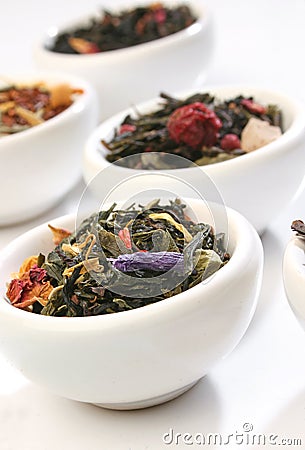 Various bowls of premium tea leaves Stock Photo