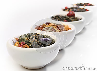 Various bowls of premium tea leaves Stock Photo