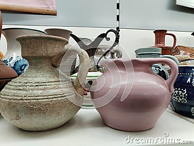 Various ceramic plates and glasses Editorial Stock Photo