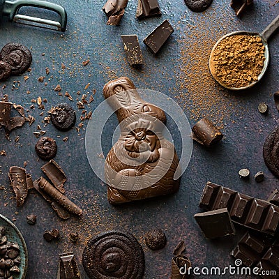 Various chocolate pieces with a chocolate bunny in the middle. Stock Photo