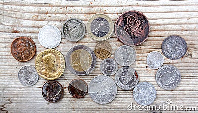 various coins on wood background Stock Photo