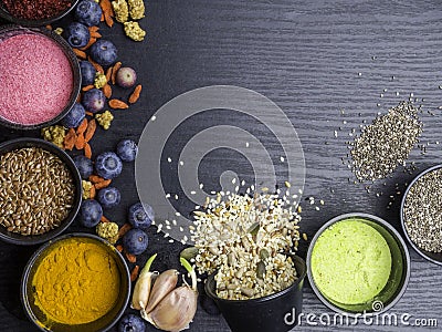 Various colorful superfoods collection on dark background Stock Photo
