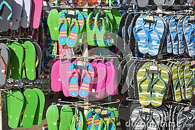 Various colourful slippers on display Editorial Stock Photo