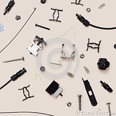 Various components for solar panels minimal concept. Pattern made of male female connectors, cable ties, tool kits, alu profile, Stock Photo