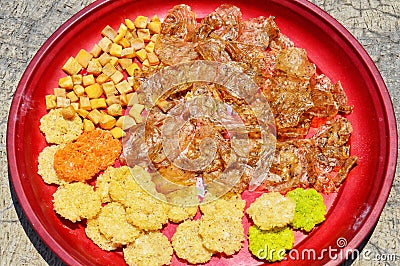 Various crackers are dried in the sun before frying Stock Photo