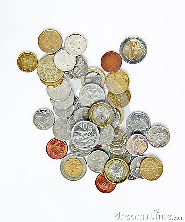 Various currency of used coins Stock Photo