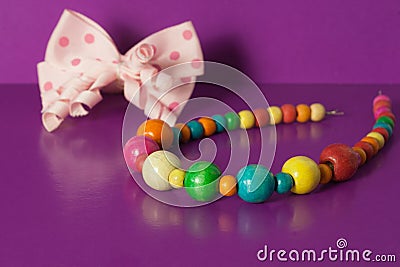 Various elastic bands, hair clips, beads, bows for girls. Stock Photo
