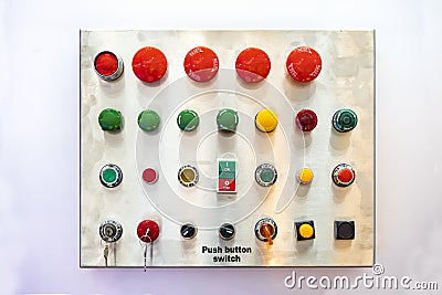 Various electric power control push button switch and status lamp select on off emergency switch and other for industrial machine Stock Photo