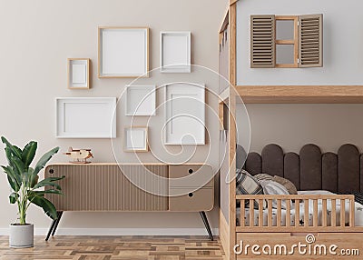 Various empty picture frames on beige wall in modern child's room. Mock up interior in contemporary, scandinavian Stock Photo