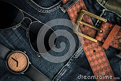 Various fashions of sunglasses, wrist watches and belt Stock Photo