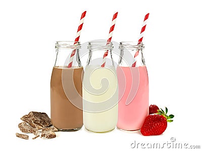 Various flavors of milk in bottles Stock Photo