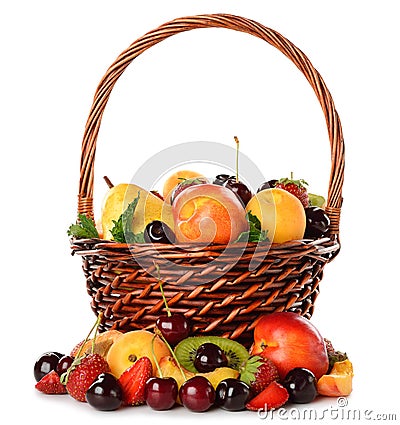 Various fruit in a brown basket Stock Photo