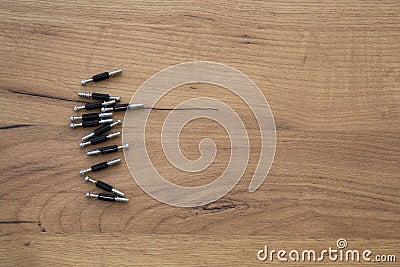 Various furniture fittings for assembling on wooden background Stock Photo