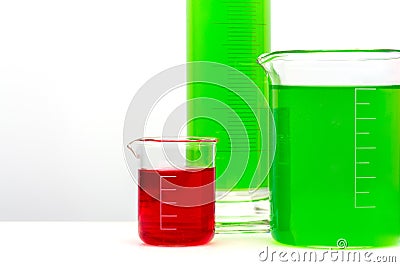 Various glass flasks with a colored liqiuds. Close up. Stock Photo