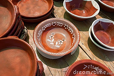 Various glazed dishes in market in Tavira, Portugal Editorial Stock Photo