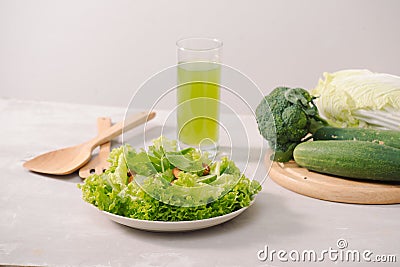 Various green organic salad ingredients on white background. Healthy lifestyle or detox diet food concept Stock Photo