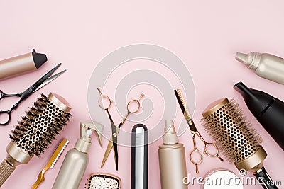 Various hair dresser tools on pink background with copy space Stock Photo