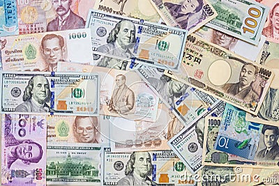 Various international foreign currency banknotes background. International trade, money cross border concept Stock Photo