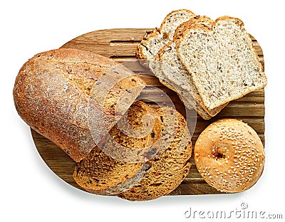 Various kinds of bread on cutting board Stock Photo