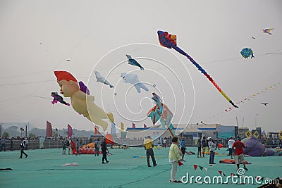 SABARMATI RIVERFRONT, AHMEDABAD, GUJARAT, INDIA, 13 January 2018. Various kites competing at the International Kite Festival Editorial Stock Photo