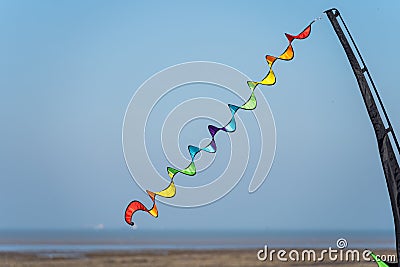 Various kites flying on the blue sky in the kite festival Stock Photo