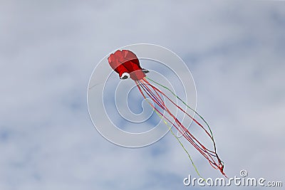 Various kites flying in the blue sky at the kite festival, Zapyskis, Lithuania Stock Photo