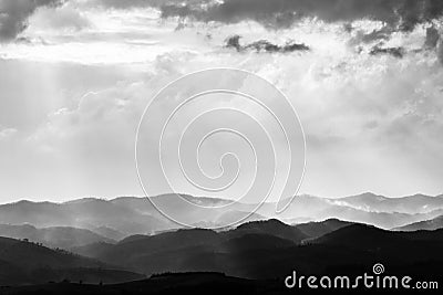 Various layers of hills and mountains with mist between them, wi Stock Photo