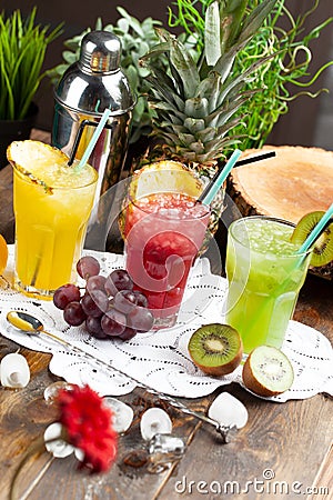 Various lemonades. Cocktails. on a wooden table. Stock Photo