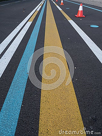 Various lines painted on asphalt Stock Photo