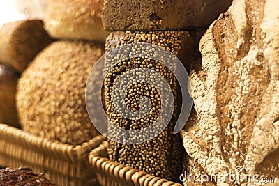Various loaves of bread in baskets Stock Photo