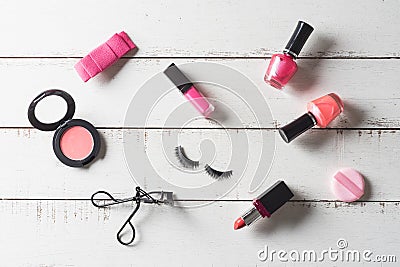 Various make-up products and cosmetics on wooden table Stock Photo